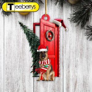 German Shepherd Sits By The Red Door Decorated With Christmas Tree Christmas Ornament